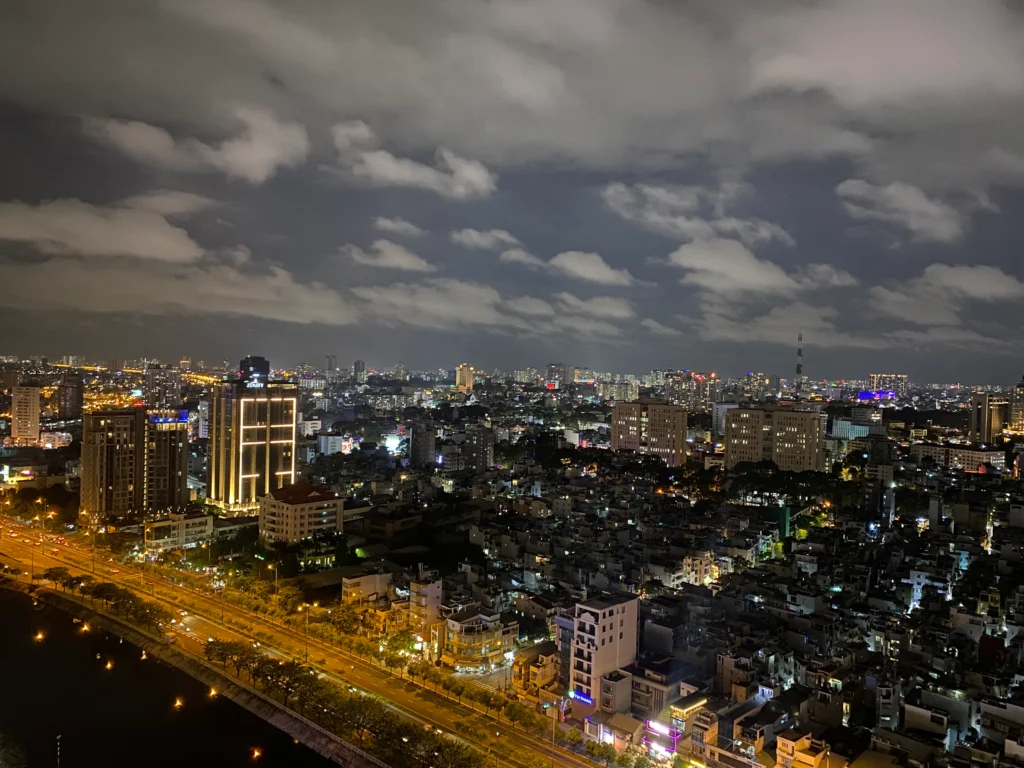 high-angle-view-illuminated-cityscape-against-sky-night